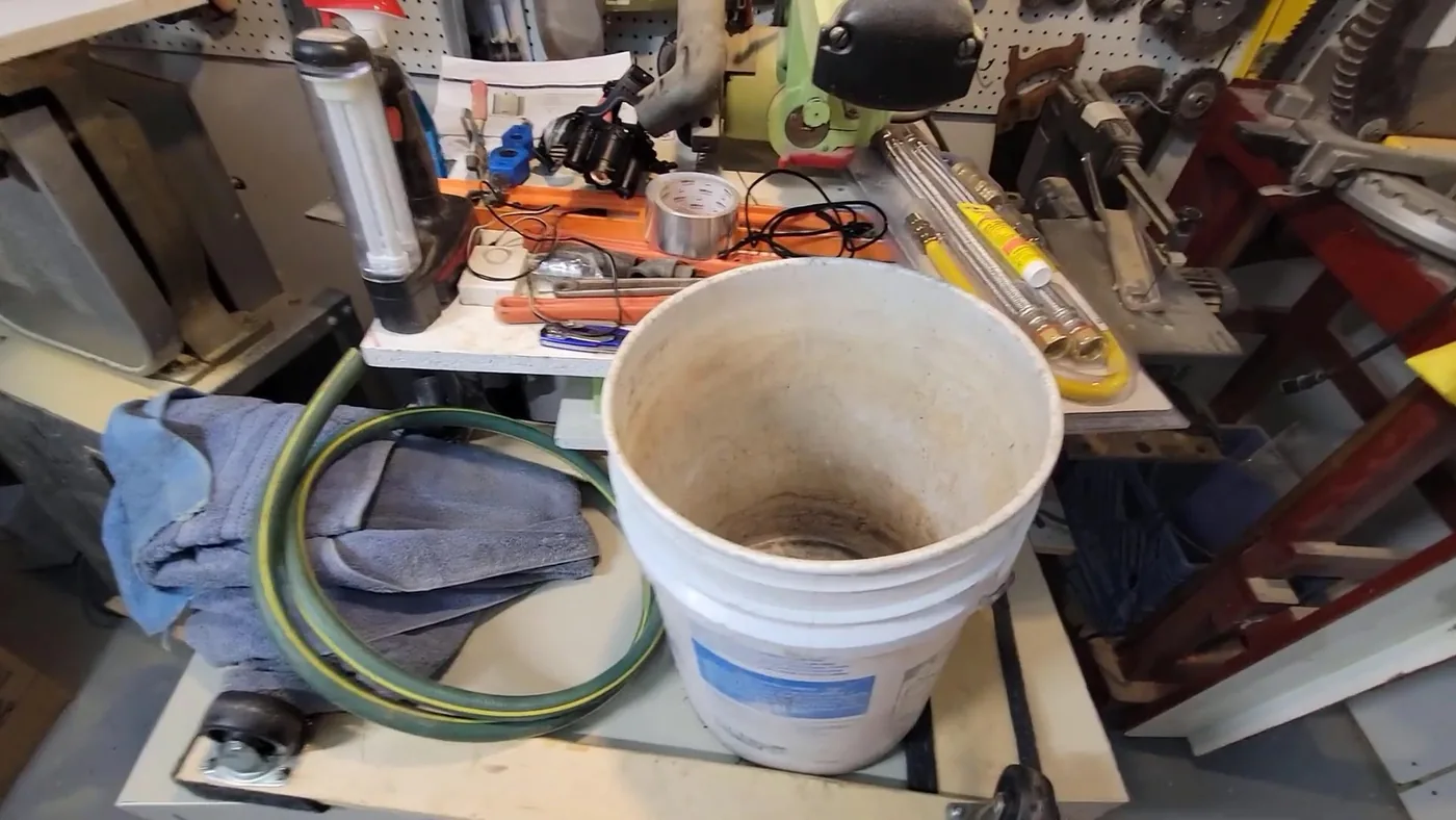 Drain cleaning tool working through a clogged line for drain cleaning in Buckeye, AZ