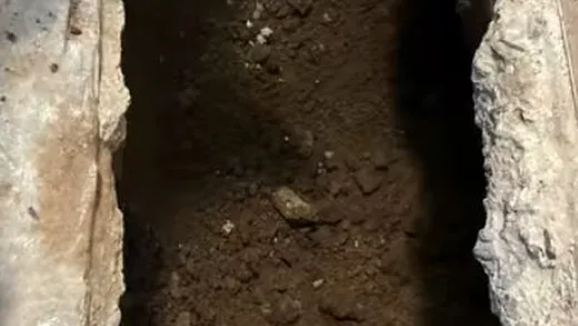 Opened concrete and pipe access for slab leak work used during leak detection work near Buckeye, AZ