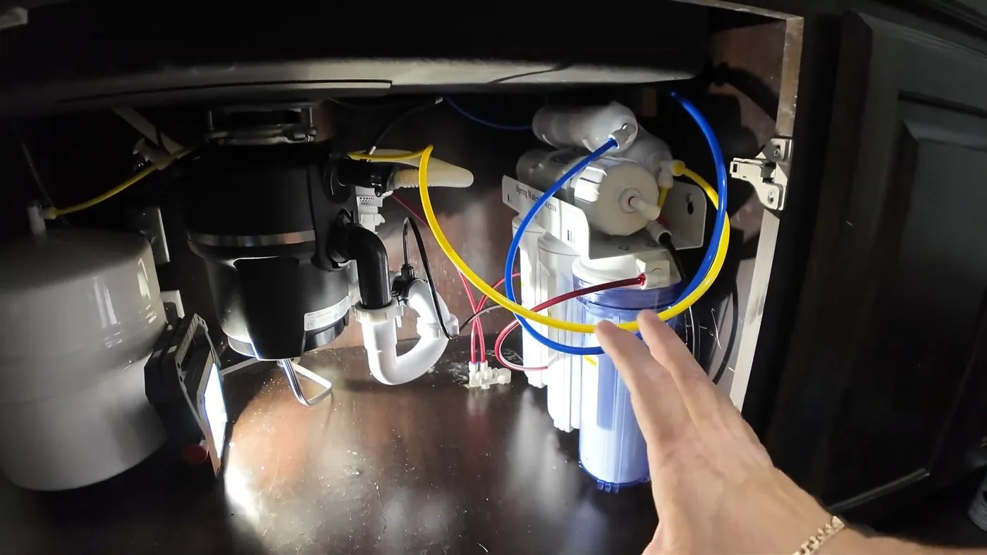 Under-sink reverse osmosis filtration system used during reverse osmosis work near Buckeye, AZ