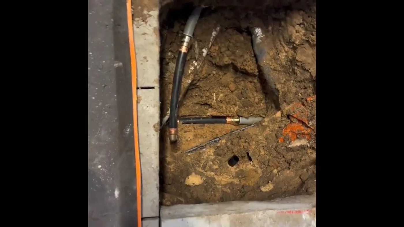 Opened concrete and pipe access for slab leak work used during slab leak work near Buckeye, AZ