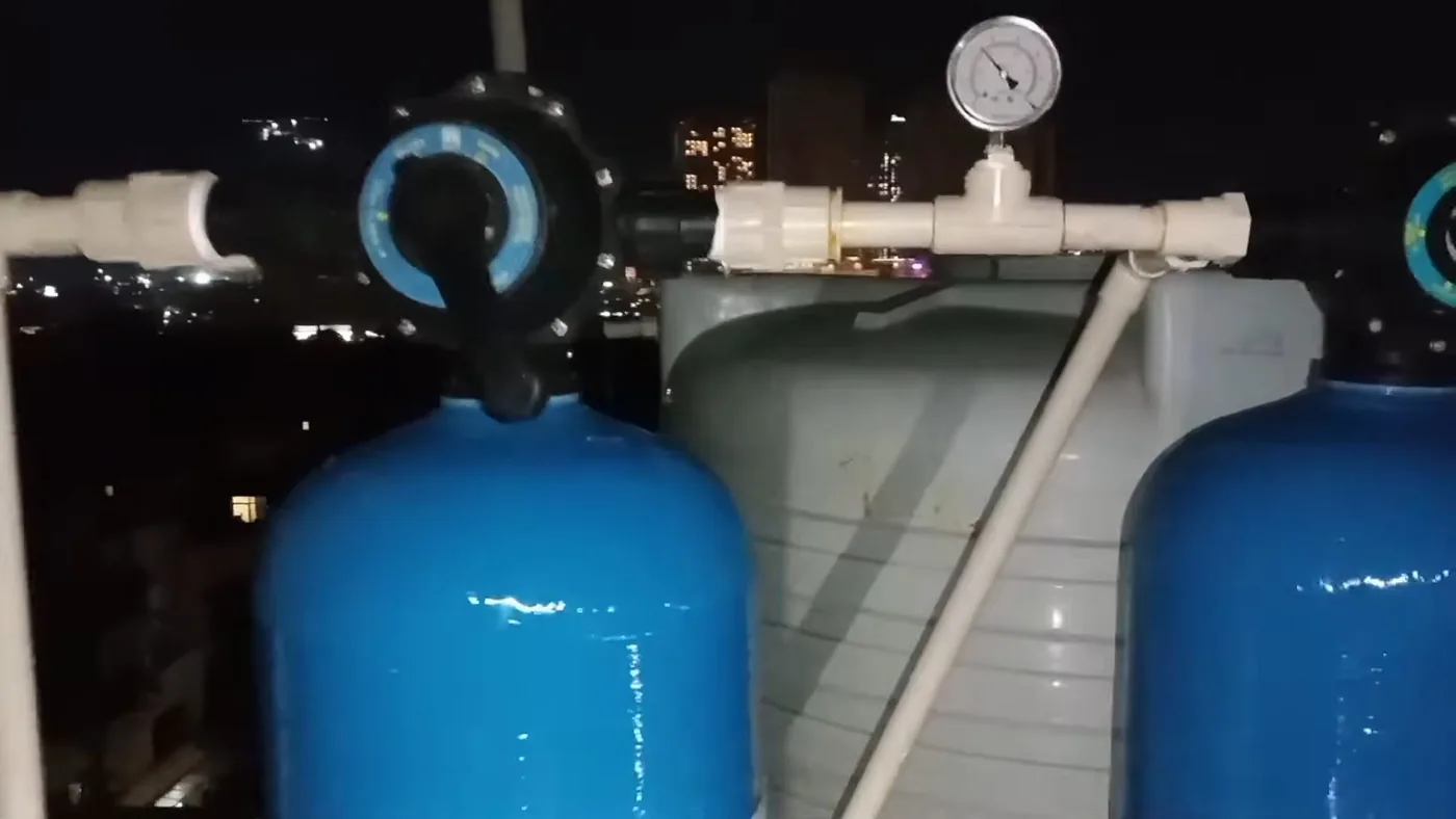 Water softener tank and brine system showing kitchen detail for water softener in Buckeye, AZ