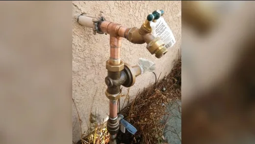 Sink faucet, drain, and shutoff connection used during residential community work near Surprise, AZ